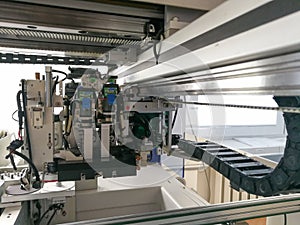 Inside electronic pick and place machine for PCB assembly