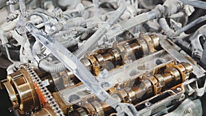 The internal combustion engine, disassembled, repair at car service, overhaul, under the hood of the car