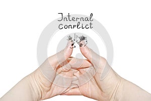 Internal conflict inscription.Two women`s hands of the same person, interlock fingers on white background. Clasped Hands