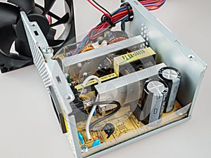 Internal device, computer power supply repair, disassembled PSU, capacitors, electronics, selective photo
