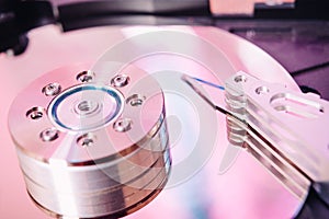 Internal hard disk closeup on wooden background