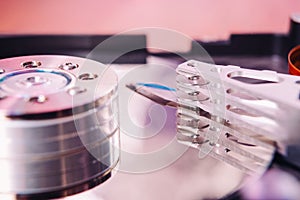 Internal hard disk closeup on wooden background