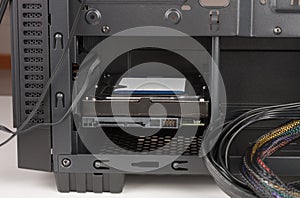 Internal hard drive inserted in computer case