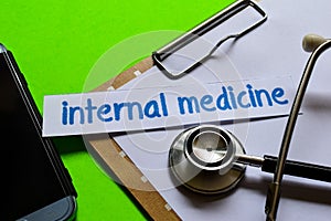 Internal medicine on Healthcare concept with green background