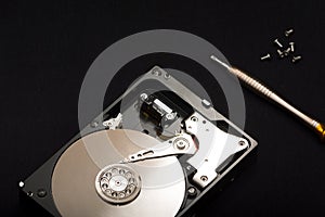 Internal parts of the hard drive. HDD. Computer memory. Modern technologies. Computer repair. Data storage concept. Black