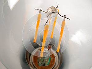 the internal structure of a modern led energy-saving lamp, diode circuit, environment-friendly, economical light bulb, close-up