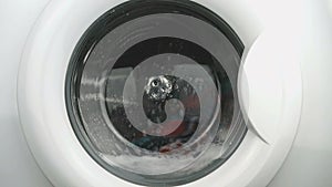 Internal view of a washing machine drum. Close-up