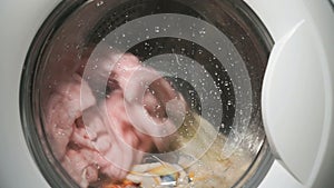 Internal view of washing machine drum during wash