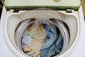 Internal view of a washing machine drum during wash photo