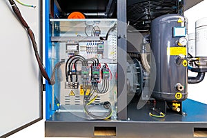 Internal wiring and components of industrial air compressor unit
