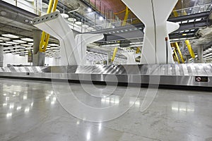 International airport baggage belt claim area. Nobody. Travel ba