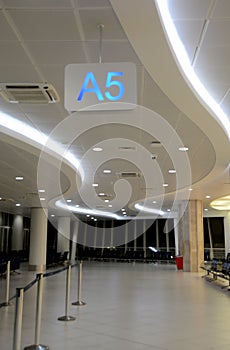 International Airport sign to Gates and baggage claims and toilette