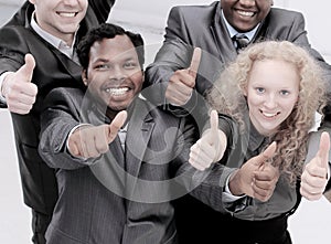 International business team showing thumbs up. the concept of t