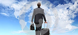 International businessman travel with trolley, global business