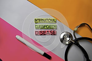 International Classification Disease ICD text on sticky notes with color office desk. Healthcare/Medical concept