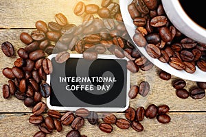 International Coffee Day inscription on the wooden board. International Coffee Day Celebration.