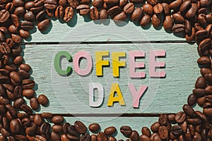 International Coffee Day on the wooden background