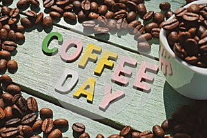 International Coffee Day on the wooden background