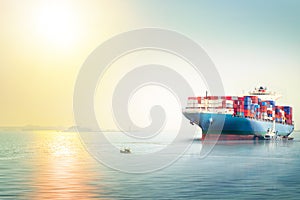 International Container Cargo ship in the ocean at sunset sky, Freight Transportation, Nautical Vessel