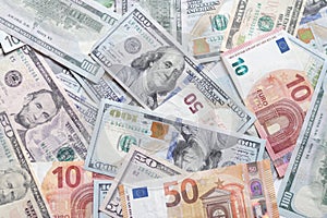 International currencies background. Money from different countries: dollars, euros. euro and dollar banknotes. money background.