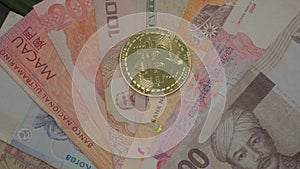 International Currency Banknotes with Digital Cryptocurrency Bitcoin