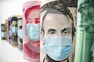 International currency money face mask concept of coronavirus disease COVID-19