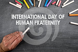 International Day of Human Fraternity, 4 February. Gray chalk board