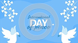 international day of peace lettering with doves