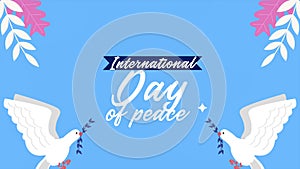 international day of peace lettering with doves flying