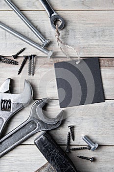 International Father`s Day.  Work tools on a gray wooden background