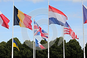 international flags flying during the international meeting