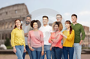 International group of happy people over coliseum