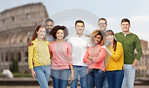 International group of happy people over coliseum