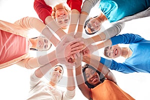 International group of women with hands together photo