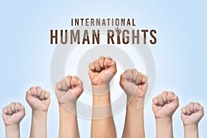 International Human Rights Day concept, raise hand up