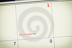 International Labor Day text on old calendar.