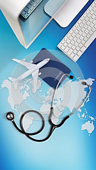 International medical travel insurance concept,stethoscope, passport, computer and airplane on sky background with global map