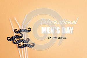 International men`s day background with drinking straws for part