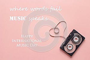 International Music Day background with audio cassette tape in t