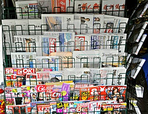 International newspapers stand in Europe
