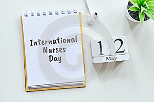 International Nurses Day 12 twelfth May Month Calendar Concept on Wooden Blocks photo