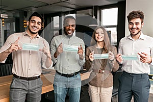 International people wearing medical masks a office