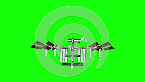 International Space Station ISS revolving over earths atmosphere. Green screen. Elements of this image furnished by NASA.