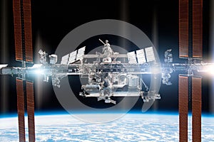 International Space Station in orbit against the backdrop of the planet Earth. Elements of this image furnished by NASA