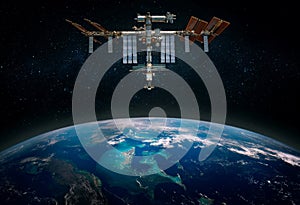 The International Space Station orbiting planet Earth. Elements of this image furnished by NASA. Scientific space exploration