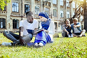 International students disregarding bad mannered people in background