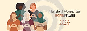 International Women\'s Day banner 2024. IWD InspireInclusion horizontal design with girls shows Heart Shape with their hands. photo