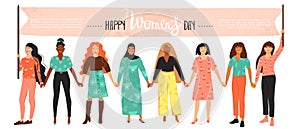 International Women`s Day concept. Group of women different nationalities and cultures holding a flag with congratulations.