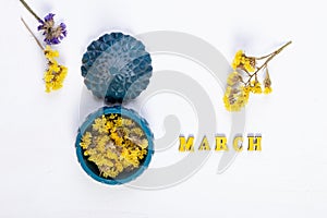 International Women's Day greeting card design. Beautiful flowers and text Happy 8 March on white background, flat
