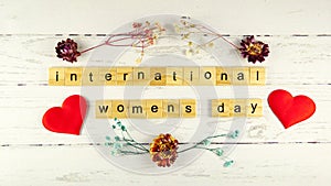 International Women`s Day.words from wooden cubes with letters photo